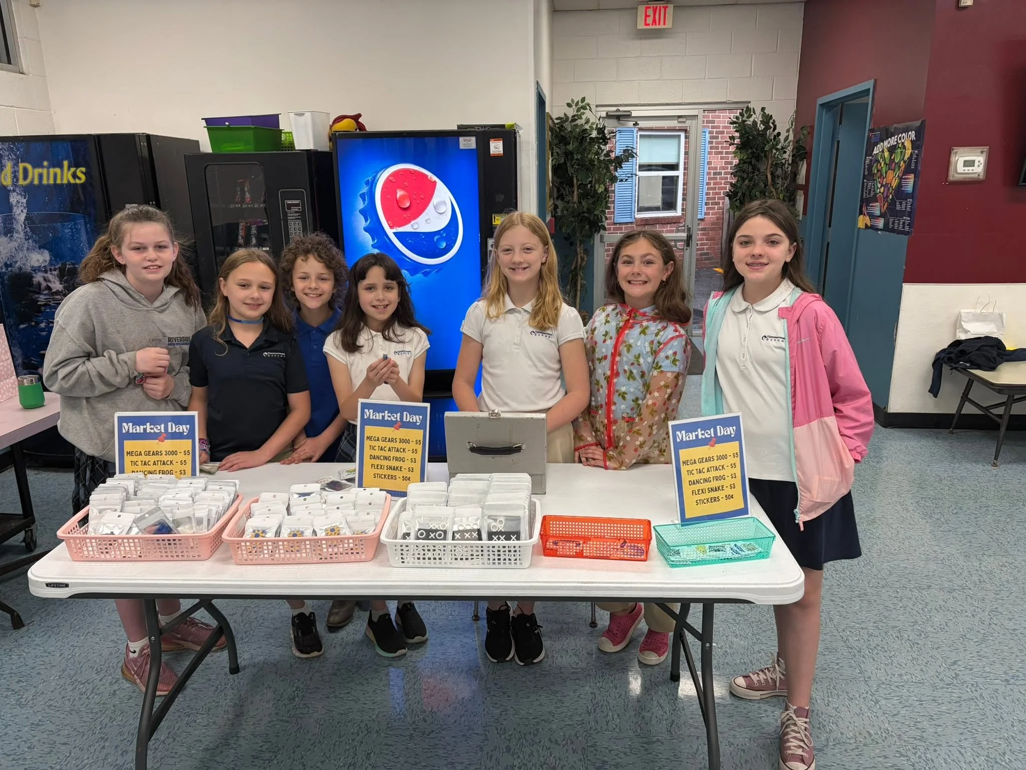 Timmerman STEAM students selling Market Day products in the Commons