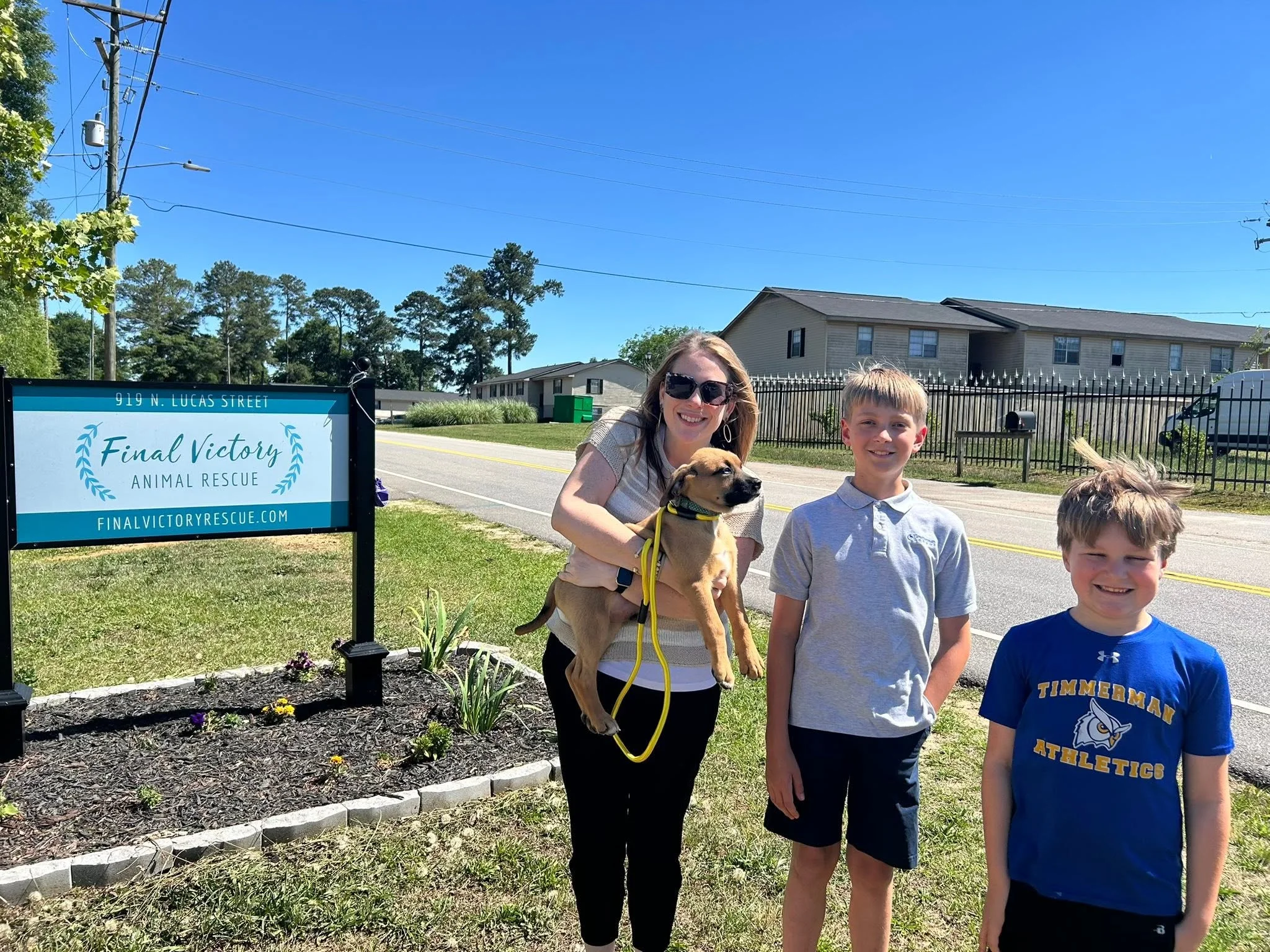 Timmerman students presenting $700 donation check to Final Victory Animal Shelter