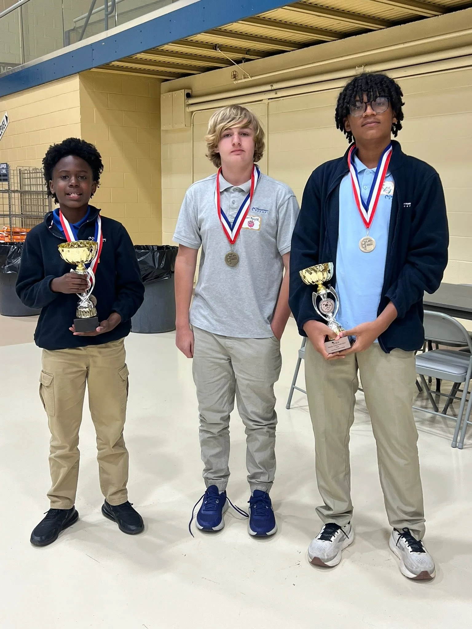 Individual SCISA Math Meet trophy winners Angelo Morris, Joshua Martin, and Liam Palyok